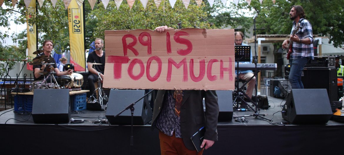 A protestor at the Woordfees Launch dinner. Photo by Lonwabo Nkonzo.